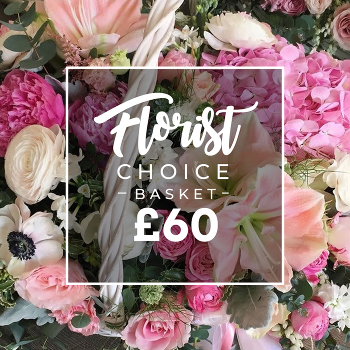 An artful, ready-to-gift arrangement that exudes elegance, photographed as a vibrant overhead spread from Flowers Golders Green. The Florist Choice Basket is filled with a lush mix of soft pinks, creamy whites, and deep fuchsias, balanced by rich eucalyptus greens and delicate foliage. The star blooms command attention: large hot pink peonies with ruffled petals; pale pink hydrangeas forming cloud-like clusters; blush and cream roses; white ranunculus with tightly wound layers; and pristine white anemones with dark centers. A hint of peach amaryllis or similar trumpet-shaped flowers adds warmth and variety, while filler blooms weave through the bouquet. The pieces rest in a sturdy, pale-woven basket with a visible handle, combining rustic charm with refined presentation. A white square overlay sits in the center, presenting Florist on one line, CHOICE - BASKET - in uppercase sans-serif, and the price ?60 in bold. The image can be imagined on a doorstep in Golders Green, awaiting delivery for a birthday, anniversary, or special occasion-our team can arrange same-day delivery across NW11 and nearby Hampstead Garden Suburb. The visual promises a premium gift, with careful layering and artistry that reflects the care of Flowers Golders Green, rooted in the local community.
