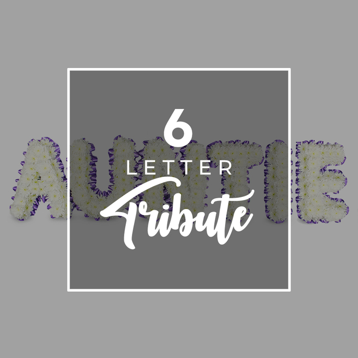 A poignant and detailed image of a custom floral tribute designed to spell AUNTIE in six freestanding letters, set against a soft neutral gray backdrop. Each letter is built from a dense cluster of small, fresh white chrysanthemums, so the surface looks full, velvety, and almost cloud-like. A distinct purple trim traces the edges of every letter-an edge of color that adds definition and dignity without overpowering the white bloom. Superimposed in the center of the arrangement is a square white frame; within it, a clean sans serif announces 6 LETTER, followed by the graceful script Tribute, signaling a personalized memorial. The overall effect is one of careful craftsmanship and heartfelt remembrance, ideal for a funeral display, wake, or sanctuary of memory. In Golders Green and surrounding NW11, families turn to local florists for bespoke tributes that speak of their relationship with Auntie, and this piece performs that role with sober elegance. The flowers are chosen for freshness and longevity, ensuring the display remains vibrant through the day of the service, with a gentle scent that lingers like a memory. The composition balances solemnity and warmth, inviting mourners to pause, reflect, and feel the presence of a beloved family member even in absence.