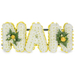 A meticulously crafted, three-dimensional floral tribute spells out the word MAM in bold capital letters, each letter built up from a dense carpet of small, pristine white chrysanthemum spray blooms that read as soft, cloud-like texture from a short distance. The edges of every letter are crisply defined by a pleated, sunny yellow ribbon that traces the perimeter with a neat, satiny fold, the warm colour creating a bright, uplifting halo against the white flowers. The first and last M are gently punctuated with accent clusters: at each outer upright sits a tightly furled yellow rose bud as the focal point, its petals promising a delicate, velvety scent that mingles with the faint citrus-fresh perfume of white freesia and similar small white buds. Around those central roses we layered slender, dark green fern fronds and glossy deeper-green leaves for contrast, the foliage giving a cool, structured frame to the soft florals. Behind the upper sections a discreet dark green or black horizontal support bar runs through, connecting the letters and suggesting a freestanding tribute built for stability at a graveside or service. The whole composition is photographed against a pure white background under soft, even lighting that highlights the subtle shadows between flowers and ribbon pleats, so the yellow, white and green read clearly and calmly. As a sympathy piece intended to honour a beloved mother or maternal figure, this arrangement balances purity and warmth: the white chrysanthemums for remembrance, the yellow accents for affectionate light. A seasoned florist would describe its tactile density, its understated scent, and its quiet dignity-an appropriate, heartfelt tribute for funeral or memorial display in the Golders Green area and beyond.